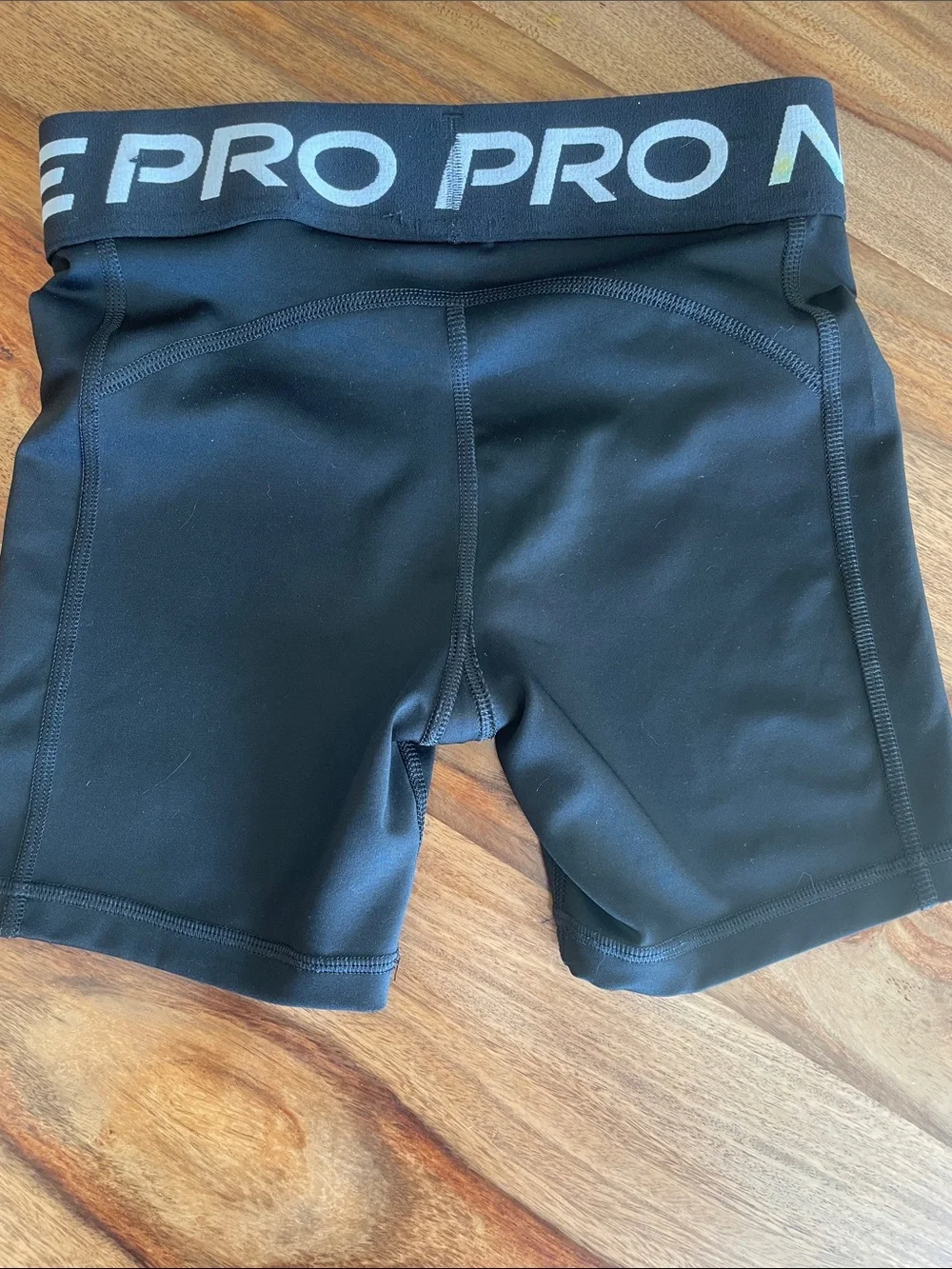 Nike Black Compression Shorts with White Swoosh